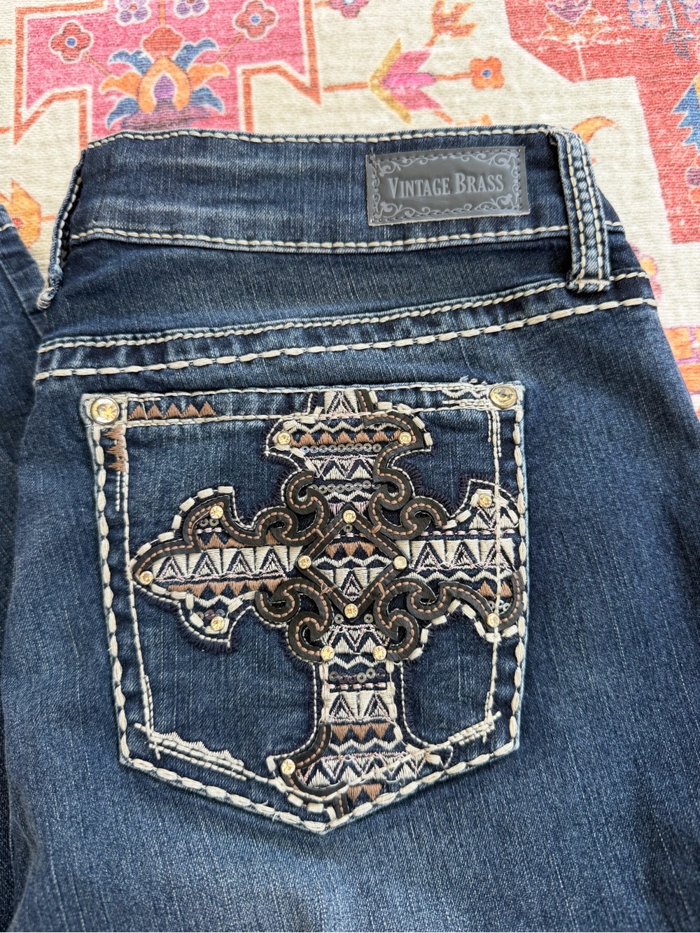 Vintage Brass Women's Dark Blue Skinny Jeans with Embroidered Cross Pocket